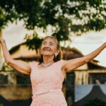 Woman Raising Her Both Hands